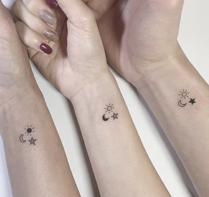 tatuagem de amizade sol lua e estrela
